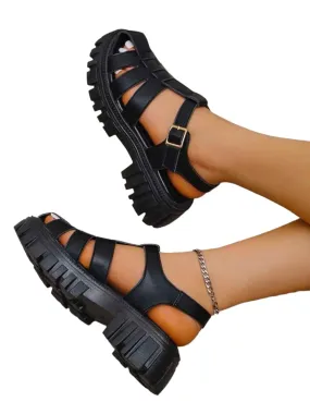Black plastic sandals